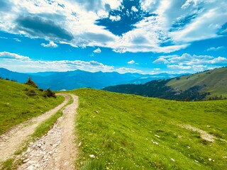 Fototapeta na wymiar Beautiful pathway in the mountains, hiking closer to the sky