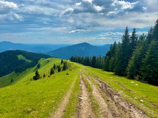 Epic road on an alpine region in the mountains, perfect place for travelling and exploring the...
