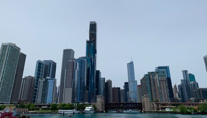 Fototapeta na wymiar Chicago River Skyline on Cloudy Day Blue