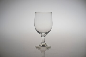 Still Life transparent clear glass shape on a white background.
