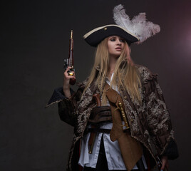 Corsair blond with guns against dark background