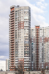 Multi-storey building in new residential complex Emerald Hills against the sky in Krasnogorsk city