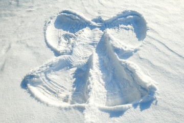 angel in the snow. children's fun in the snow