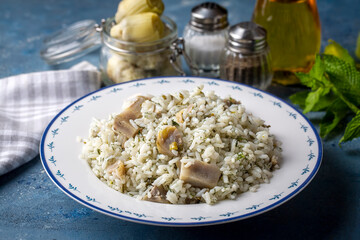 Traditional delicious Turkish foods; Artichoke rice (Turkish name; Enginarli pirinc pilavi)