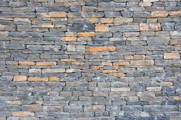 Gray modern pattern of stone wall decorative surfaces. The stone wall texture background natural color. Old Brick texture, Grunge brick