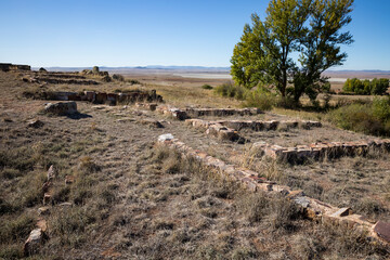 ruins at El Castellar archaeological site with a view to the Gallocanta lagoon next to Berrueco, province of Zaragoza, Aragon, Spain
