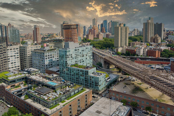 NYC cityscape panning of downtown Brooklyn district with Manhattan Bridge beautiful aerial skyline New York City