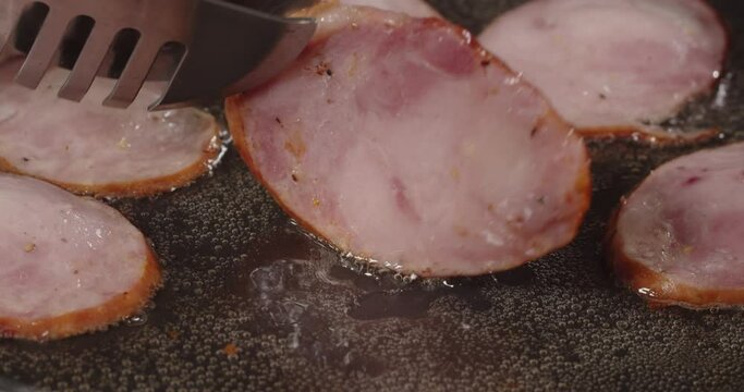 ry pieces of sausage on both sides in a preheated pan