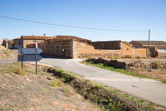a paved road going through Tornos village, province of Teruel, Aragon, Spain