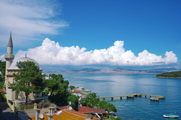 Burgazada view from a high building with mosque and clouds. Scenic view.                          