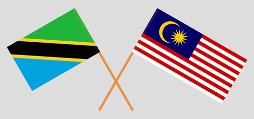 Crossed flags of Tanzania and Malaysia. Official colors. Correct proportion