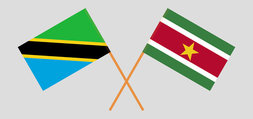 Crossed flags of Tanzania and Suriname. Official colors. Correct proportion