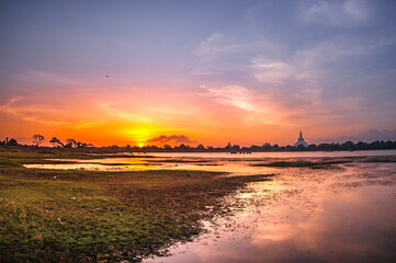 Ruwanwelisaya the biggest stupas in sri lanka at dawn seen from thisa wewa, Anuradhapura, Sri Lanka