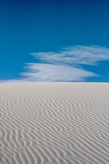 Fototapeta na wymiar Diagonal Ripples Across White Sand Dune