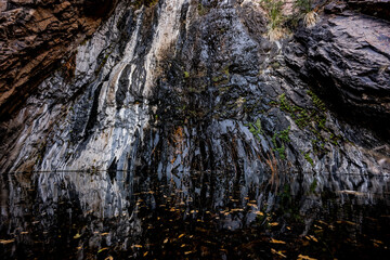 Fototapeta na wymiar Dramatic Texture On The Wall of Cattail Falls