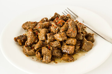 The Sacrifice Festival Food From Turkish Cuisine is braised beef meat,Kavurma on white surface with copy space