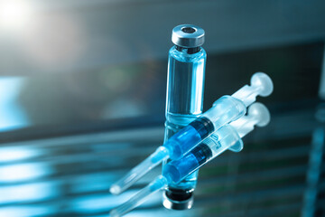 Medical ampoule or test tube in the laboratory. The pandemic or covid virus concept