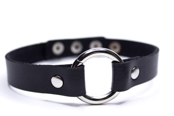 Leather choker with a circle. Decoration on the neck. Isolated on a white background.