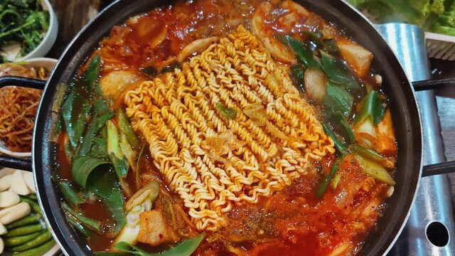 Eating dinner Korean ramen with friends, close-up Korean noodles Taken with a top view camera