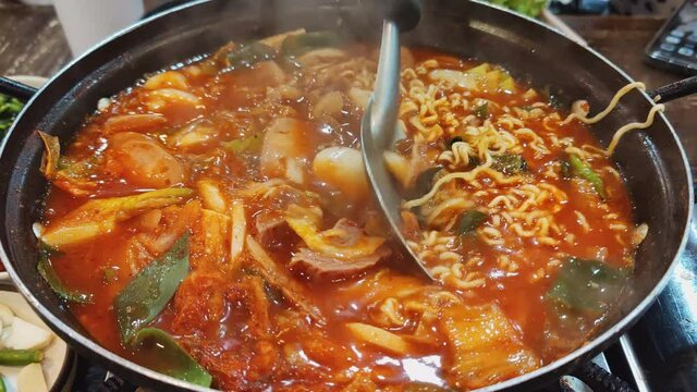 Eating dinner Korean ramen with friends, close-up Korean noodles Taken with a top view camera