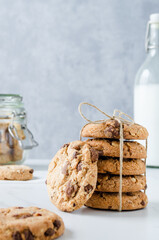 Chocolate chip cookies with milk on marble