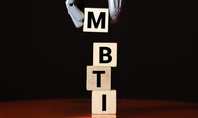 MBTI acronym, inscription on wooden dices. Types of personalities concept.