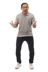 Man wearing casual grey shirt black denim and white shoes, excited surprised shocked with mouth open looking at camera, amazed wow espression. Full body portrait isolated