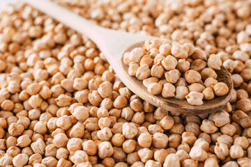Heap of dried chickpeas, isolated on white background