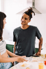 Two lovers cooking together