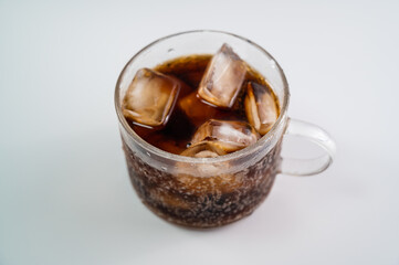 Cola in a cup with ice