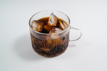 Cola in a cup with ice