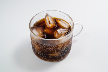 Cola in a cup with ice