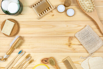 Natural cleaning bamboo, coconut dish brushes on wooden table. Eco friendly with No plastic kitchen and home cleaning. Top view, flat lay. Sustainable lifestyle, Zero waste concept.