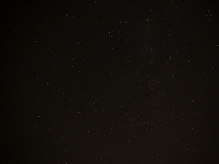 Cluster of Colorful Stars in a Clear Night Sky Constellations