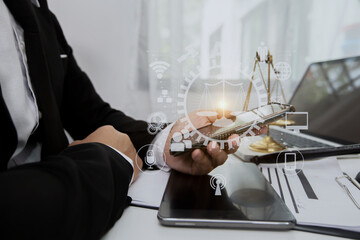 Concepts of Law and Legal services. Lawyer working with law interface icons. Blurred background.	