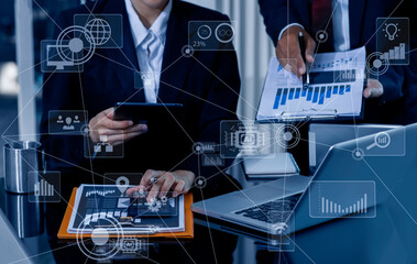 Businessman hands working on network and digital finance marketing chart with future technology innovation and digital transformation concept.
