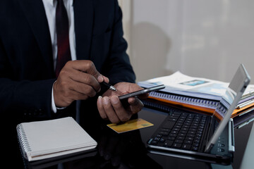 Hands working on smartphone.