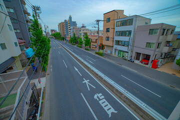 Obraz premium A traffic jam at the avenue daytime in the downtown wide shot