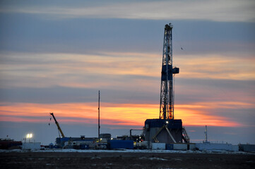 The drilling rig during sunset