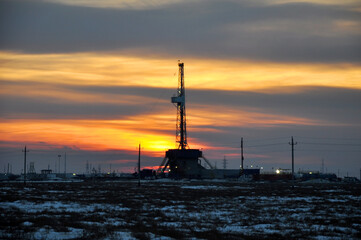 The drilling rig during sunset