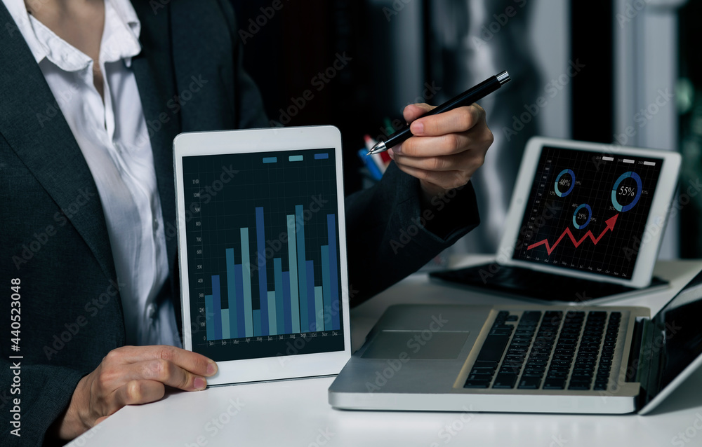 Poster selective focus of businessman hands working on data analytics report and digital finance marketing 