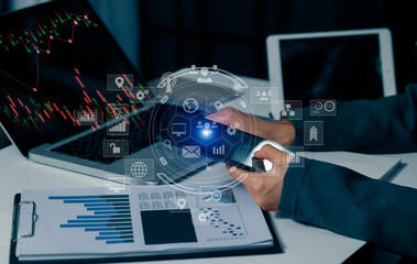 Businessman hands working on network and digital finance marketing chart with future technology innovation and digital transformation concept.