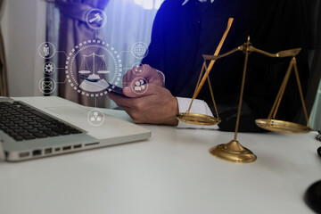 Concepts of Law and Legal services. Lawyer working with law interface icons. Blurred background.