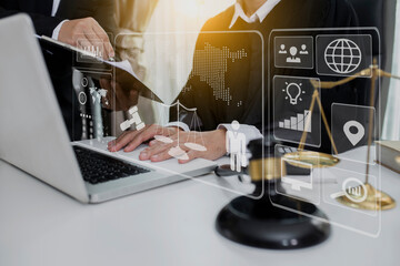 Concepts of Law and Legal services. Lawyer working with law interface icons. Blurred background.