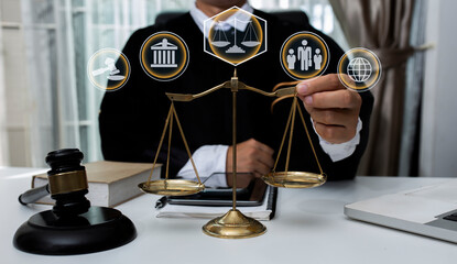 Concepts of Law and Legal services. Lawyer working with law interface icons. Blurred background.	