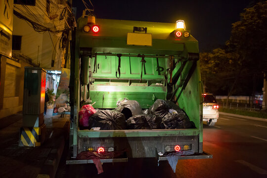 Garbage Truck On A Night Shift