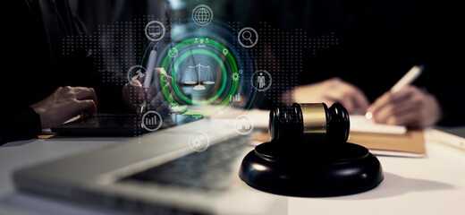 Concepts of Law and Legal services. Lawyer working with law interface icons. Blurred background.	