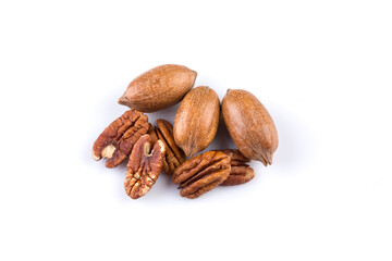 Few pecan nuts isolated on white