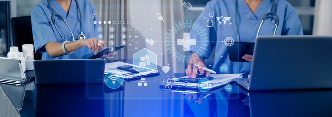 Medicine doctor working on digital tablet and hologram modern virtual screen interface icons, Medical technology and futuristic concept.