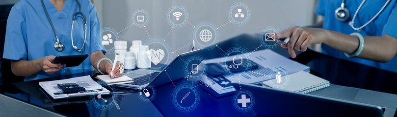 Medicine doctor working on digital tablet and hologram modern virtual screen interface icons, Medical technology and futuristic concept.